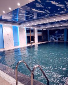 a swimming pool on a cruise ship at President kop apartment 412 in Kopaonik +5 photos