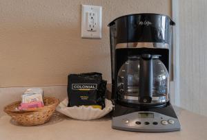 a blender sitting on a counter next to a basket at Top Floor Condo With Amazing Views Pool and Sauna in Lincoln City +29 photos