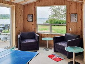 Posezení v ubytování Lakefront Retreat in Sohojlandet - By Traum Ferienwohnungen