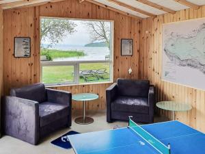 Posezení v ubytování Lakefront Retreat in Sohojlandet - By Traum Ferienwohnungen