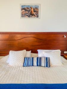 Postel nebo postele na pokoji v ubytování Galápagos Casa Playa Mann