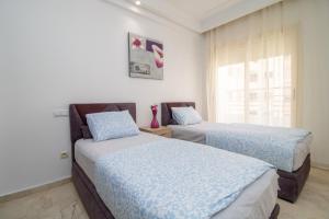 Ένα ή περισσότερα κρεβάτια σε δωμάτιο στο Anfa Dream