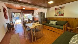 a living room with a couch and a table at Casa Chuy Barcelona in Chuy