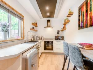 a kitchen with a sink and a counter top at Orchard Retreat in Kirton +20 photos