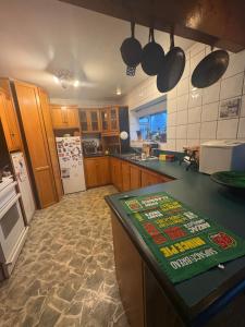 Kuchyň nebo kuchyňský kout v ubytování Cosy Colonial Cottage