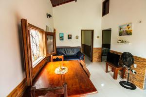 Zona de estar de Casa com ar-condicionados e localização perfeita