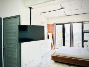 Ένα ή περισσότερα κρεβάτια σε δωμάτιο στο Silk Apartment with parking, balcony, gym and terrace in z4