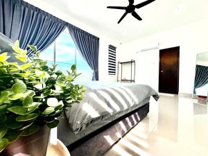 Ένα ή περισσότερα κρεβάτια σε δωμάτιο στο Gioia Home Two Taiping Town