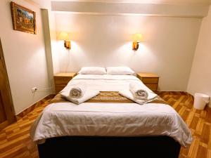 Nafis Casona Apu Linli Pisac客房内的一张或多张床位