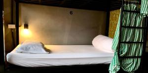 Postel nebo postele na pokoji v ubytování Doze Hostel