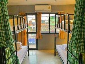 Postel nebo postele na pokoji v ubytování Doze Hostel