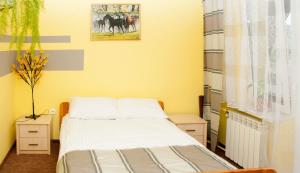 Posteľ alebo postele v izbe v ubytovaní Apartament Pod Łanem