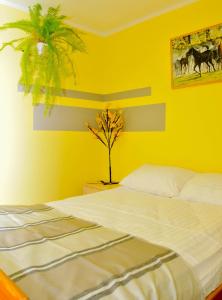 Posteľ alebo postele v izbe v ubytovaní Apartament Pod Łanem
