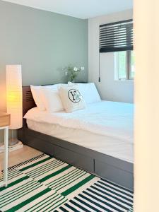 Ένα ή περισσότερα κρεβάτια σε δωμάτιο στο Solar House