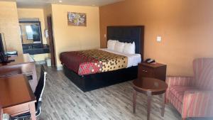 Postel nebo postele na pokoji v ubytování Econo Lodge