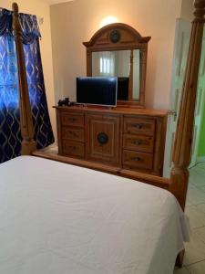 Postel nebo postele na pokoji v ubytování NesheLee Resorts