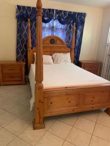 Postel nebo postele na pokoji v ubytování NesheLee Resorts