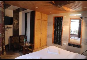 Voodi või voodid majutusasutuse Hotel Sita - The Family choice toas