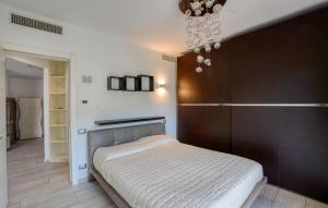 Ένα ή περισσότερα κρεβάτια σε δωμάτιο στο 2 Bedroom Cozy Apartment In Recco