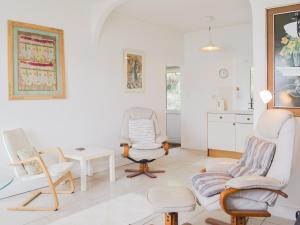 a living room with chairs and a table at Cliff Cottage - Uk43207 in Dale