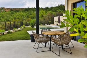 Zahrada ubytování Orange Tree Pool Villas - Sea View and Private Pool
