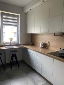 Kuchnia lub aneks kuchenny w obiekcie Apartament Miłosz