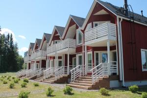 a row of houses in a row at SResort Marina Villas in Imatra