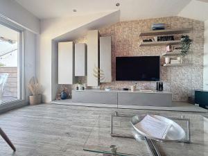Μια τηλεόραση ή/και κέντρο ψυχαγωγίας στο L’Ecrin des Cimes – Duplex, panoramic view, garage