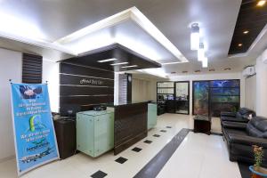 a lobby with a hair salon with a reception desk at Hotel Holy Gate in Sylhet
