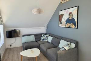 TV a/nebo společenská místnost v ubytování Tipoz'immo-Brise Marine 1-sea view-spot surf-cosy