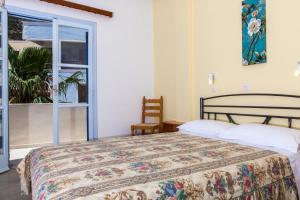 Krevet ili kreveti u jedinici u okviru objekta Akis Hotel