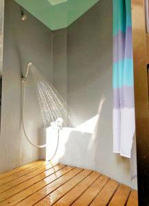 a bathroom with a hammock in the corner of a room at Star Forest Camp Hayama in Hayama