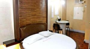 Postel nebo postele na pokoji v ubytování Bermuda Hotel