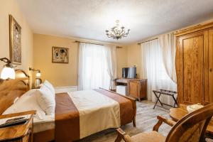 Katil atau katil-katil dalam bilik di Hotel Monte Cristo
