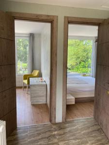 A bed or beds in a room at Kokhta guest house On the mountain