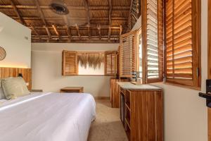Letto o letti in una camera di Islawa Soy Local - Isla Privada