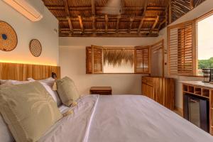 Letto o letti in una camera di Islawa Soy Local - Isla Privada