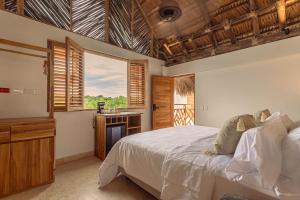 Letto o letti in una camera di Islawa Soy Local - Isla Privada