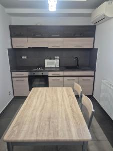 Kuchyň nebo kuchyňský kout v ubytování Willow 1BR