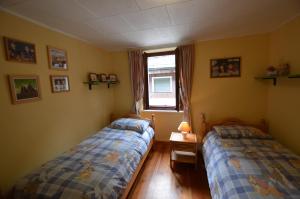A bed or beds in a room at Sabrina Fantasia
