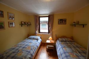 A bed or beds in a room at Sabrina Fantasia