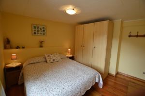 A bed or beds in a room at Sabrina Fantasia