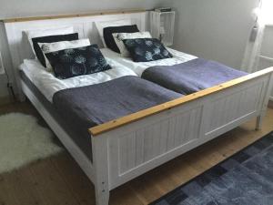 Postel nebo postele na pokoji v ubytování B&B Hannåsa Gård