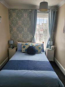 Ένα ή περισσότερα κρεβάτια σε δωμάτιο στο Twin Palms Guesthouse
