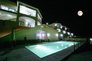Bazén v ubytování Hotel Castello Budoni nebo v jeho okolí