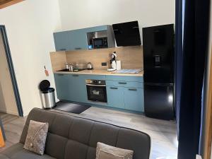 Kuchyň nebo kuchyňský kout v ubytování Magnifique appartement Seb cocooning