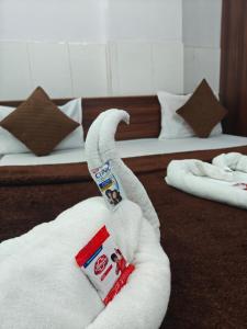 Postel nebo postele na pokoji v ubytování Hotel Dev Lakeview