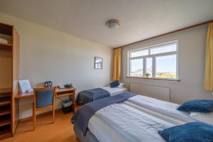 Adventure Hotel Hellissandur客房内的一张或多张床位
