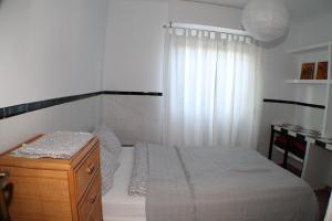 Posteľ alebo postele v izbe v ubytovaní Casa La Madriguera