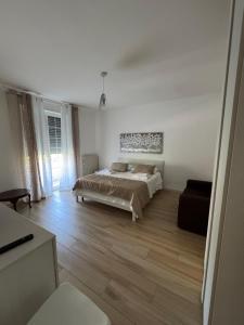 A bed or beds in a room at B&B Pan del Cucco Még 4 kép